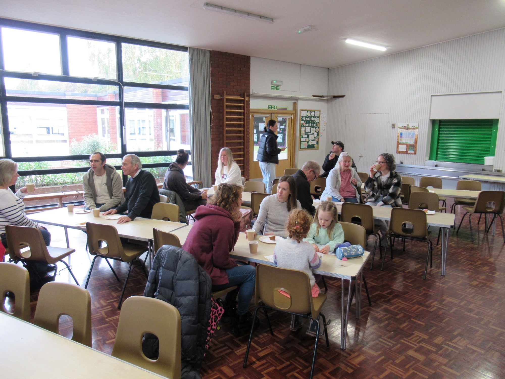 Parents enjoying their coffee and cakes