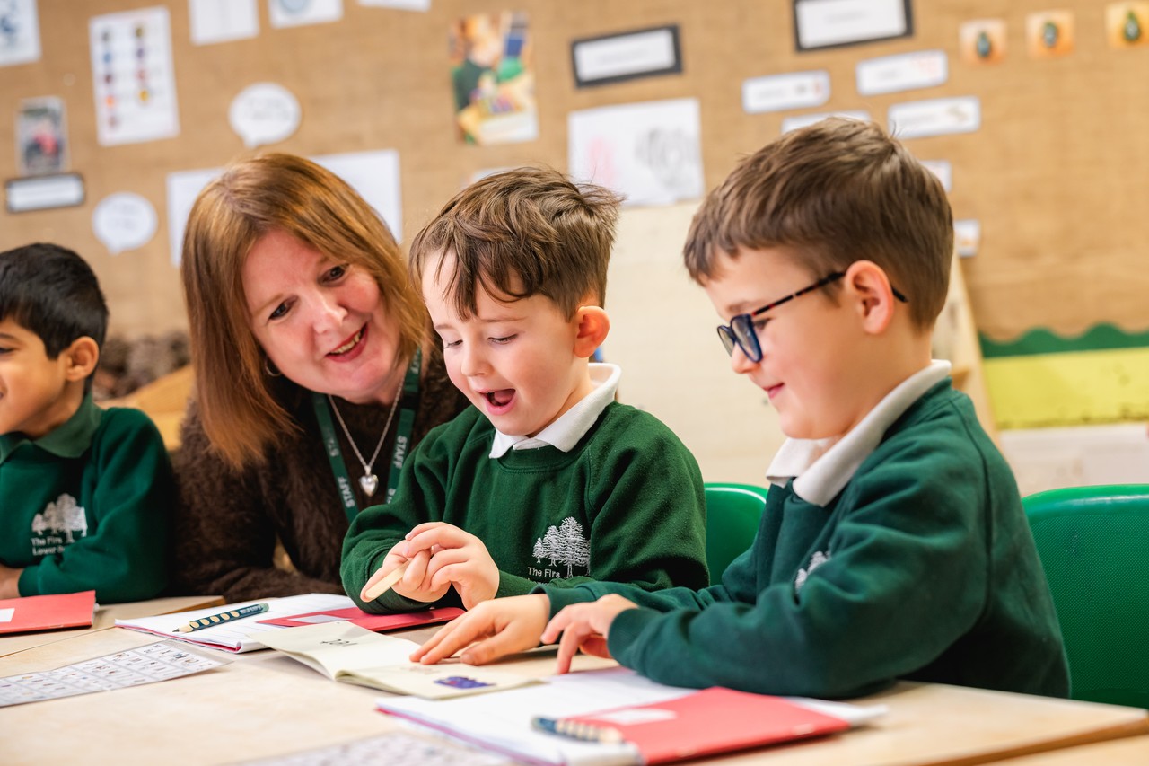 Children with teacher in a RWI leson