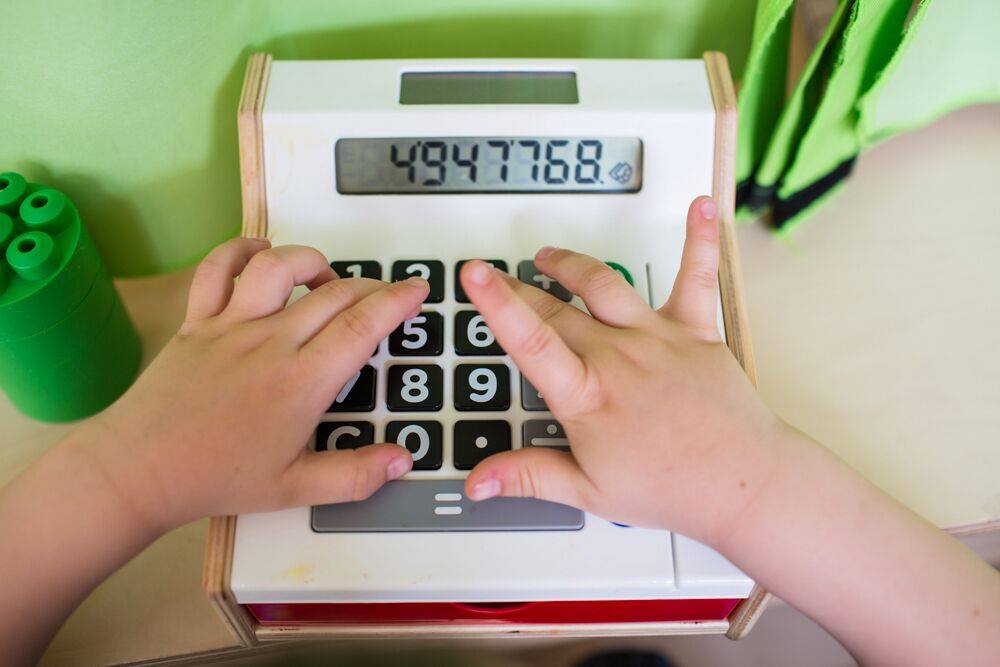 Child using calculator