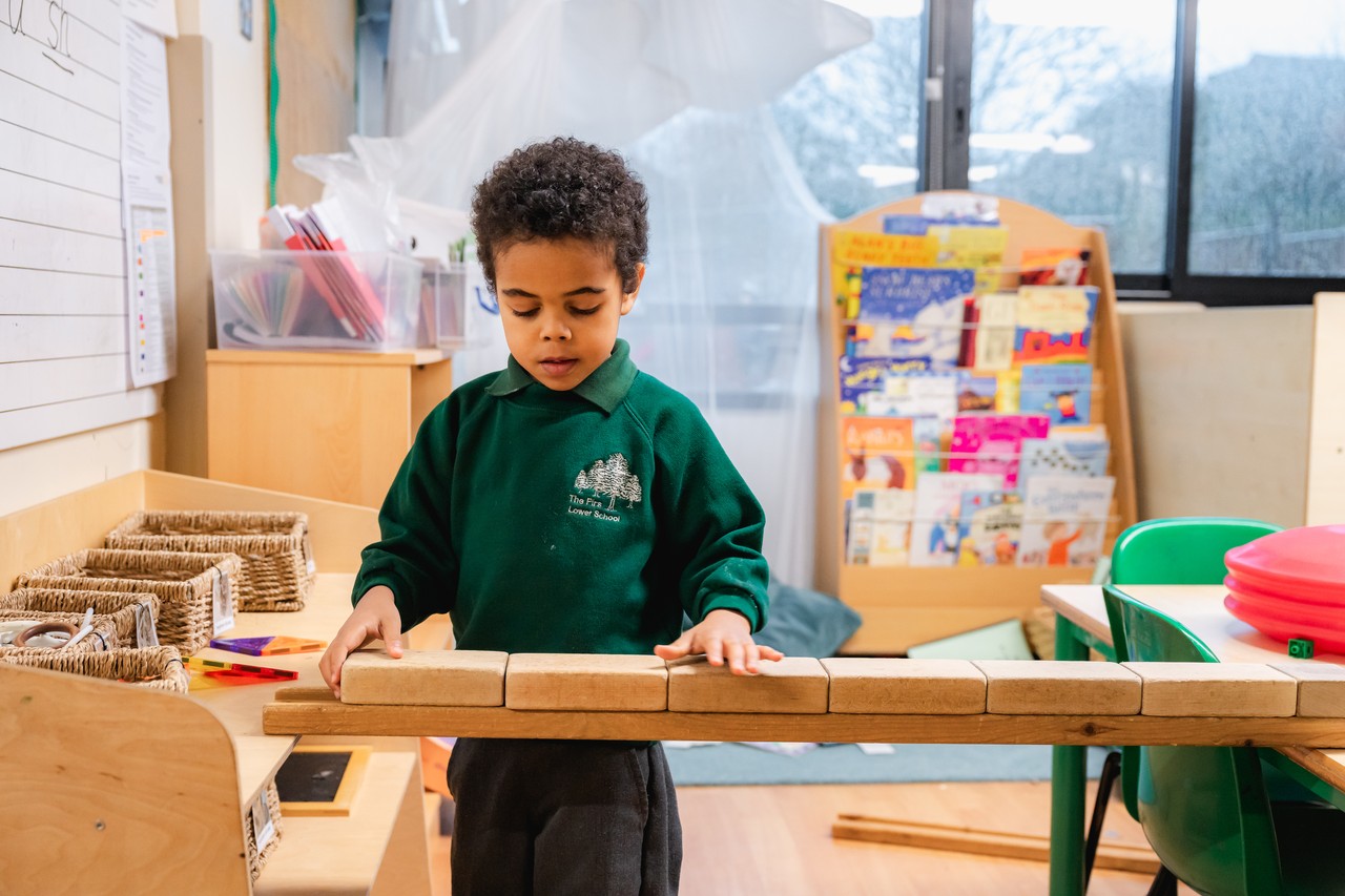 Child building a bridge